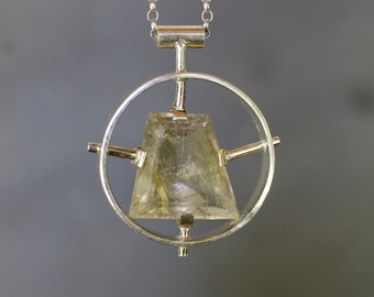 Rutilated quartz and sterling silver pendant