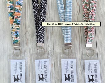 Cordón/porta credencial tipo coletero - Rifle Paper Co. Con o sin cierre de seguridad 6