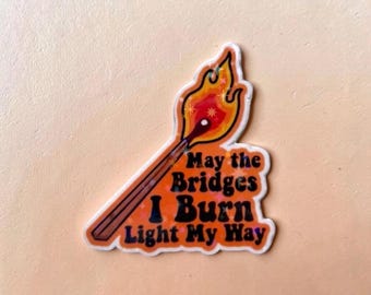 May the bridges I burn light my way funny sticker. holographic stars iconic sticker for laptop, office or a gift/ present.
