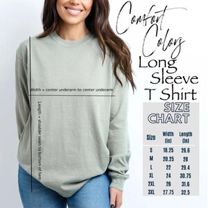 a woman wearing a long sleeve t-shirt, with a size chart provided for the shirt.