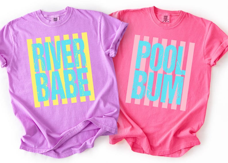 two t-shirts with different text and designs, one in purple and the other in pink.