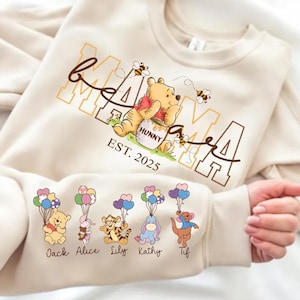 a person holding a winnie the pooh shirt