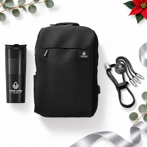 May include: A black backpack with a front zip pocket and a logo patch, a black travel tumbler with a textured grip and logo, and a black multi-connector charging cable with a circular logo hub. Each item features the text YOUR LOGO HERE.