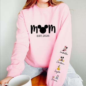 Comfort Colors®  Personalized Disney Mickey and Friends Mama Sweatshirt, Disney Custom Mom,With Kids Name On Sleeve, Mother's Day Gift