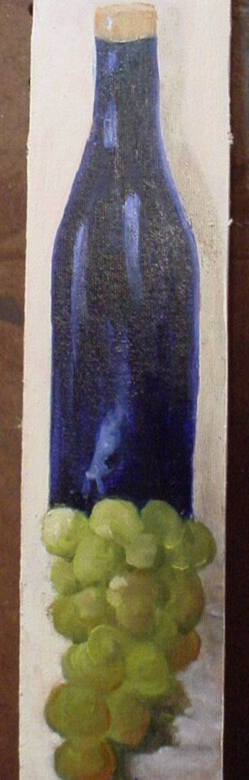 This 2"x12" oil painting of a Blue Bottle and green Grapes is ready for your collection. It is of course a  miniature.