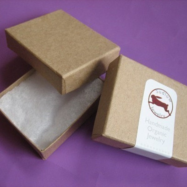 100 small Kraft cotton filled boxes