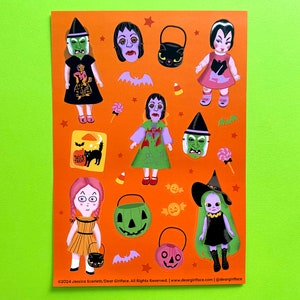 May include: A sheet of colorful Halloween stickers featuring various characters, including witches, vampires, and ghosts. The stickers are on an orange background with black bats and stars. The text "Trick or Treat" is included on one of the stickers.