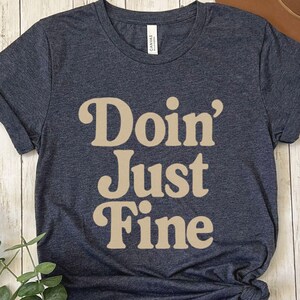 Doin&#39; Just Fine Mental Health T-Shirt, Positive Affirmation Shirt for Women & Men, Self Care Tee, Soft Comfort Graphic Top, Unisex Sizes