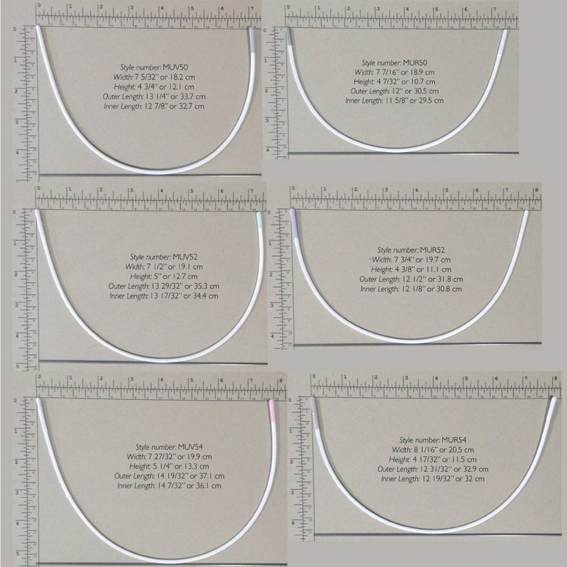 May include: Four different sizes of white metal bra strap rings, measured in inches and centimeters. The rings are displayed on a brown surface with a ruler.