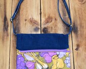 Zsuzsanna. Medium fold over cross body handbag. Adjustable strap and size.
