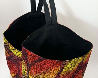 Pair of Medium-Sized Hanging Storage Baskets in an Autumn coloured leaf Ankara fabric