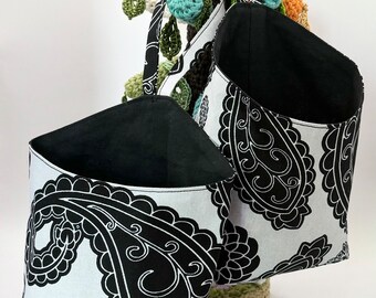 Pair of Small Hanging Storage Baskets in a black and white paisley Ankara wax print fabric