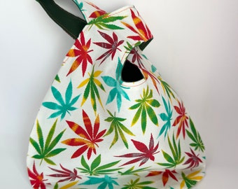 Small Japanese Knot Bag in a Multi-Coloured Marijuana leaf pattern on a white background