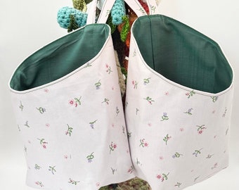 Pair of Small Hanging Storage Baskets in a pink flower print fabric with green lining