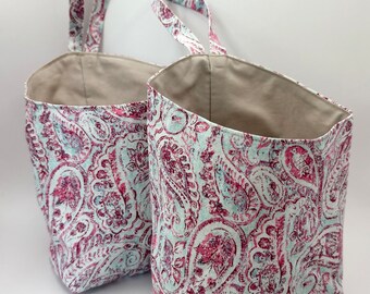 Pair of Small Hanging Storage Baskets in a paisley print in light blue, white, tan and pink