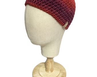 Children’s Sunset beanie in yellow, orange, pink, red and purple variegated yarn