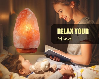 Himalayan rock salt lamp purifies air and illuminates bedrooms with its hand-carved wooden base