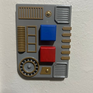 Star Wars inspired light switch cover with functional buttons!