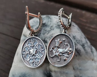 Handmade silver earrings in the Slavic style "Sirin Bird Alatyr"