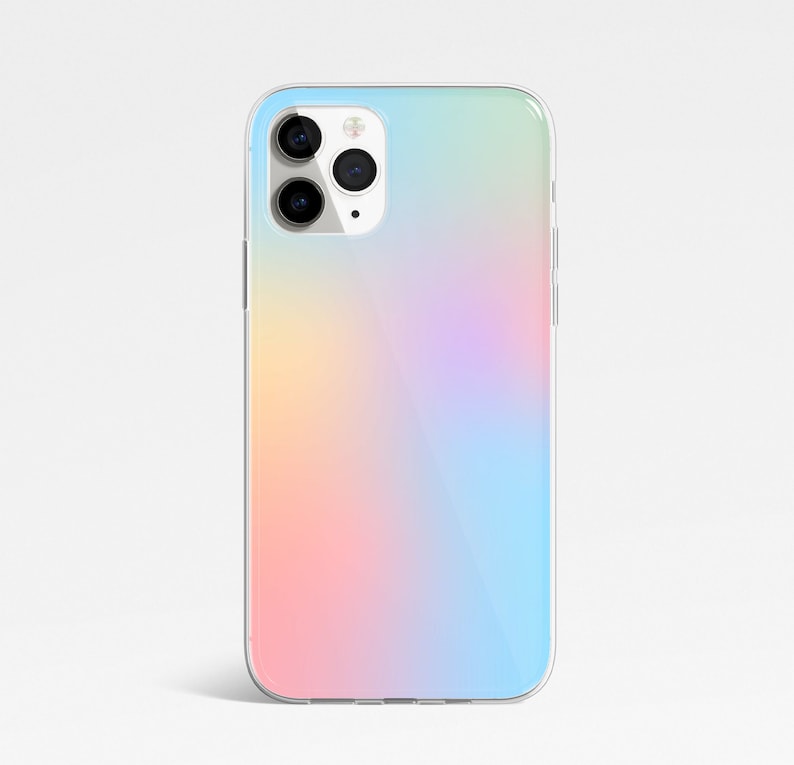 May include: A clear phone case with a gradient design featuring pink, orange, yellow, and blue colors.