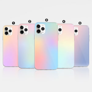 May include: Five different phone cases with a gradient design. The cases are in shades of pink, blue, and purple. The cases are numbered 1 through 5.