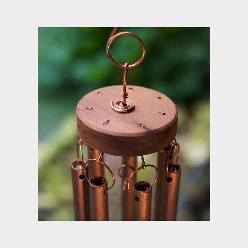 detail wood roundel for seven copper chimes wind chime