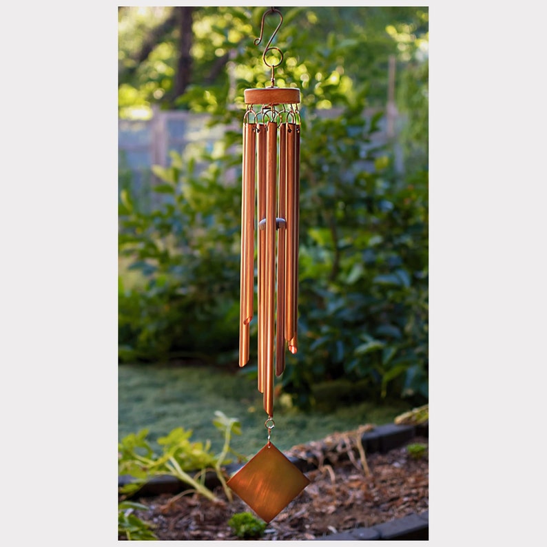 Wind chime with seven copper chimes and a copper diamond windsail, completely handcrafted by Coast Chimes.