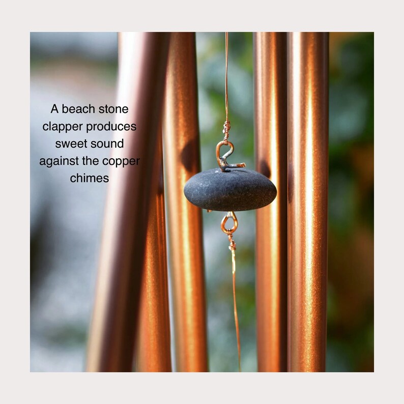 a beach stone clapper for a handmade copper anniversary wind chime