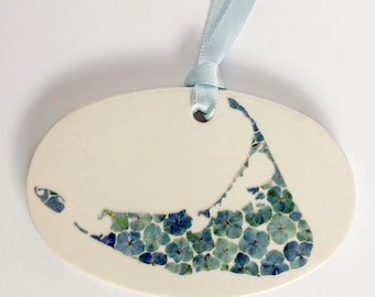 Nantucket ornament, blue hydrangea design,  4” x 3”. Clay with UV printed design