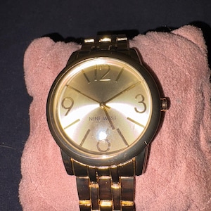 Reloj para mujer NW/1578CHGB con esfera color champán y pulsera en tono dorado