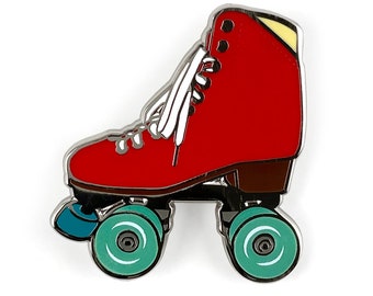 Red roller skate pin with glow in the dark wheels