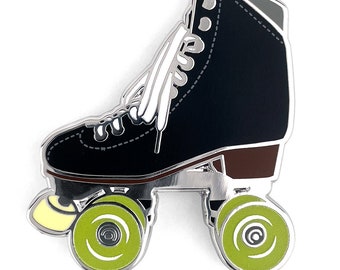 Black roller skate pin with glow in the dark wheels