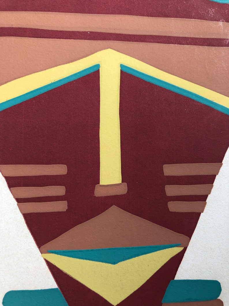 May include: Abstract geometric art print with a stylized face in shades of brown, yellow, and teal.