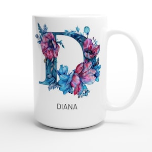 May include: White ceramic mug with a blue and pink floral design featuring the letter D and the name "DIANA" printed below.