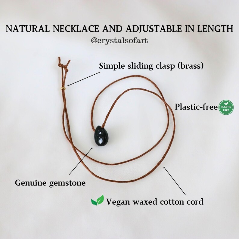 May include: A natural necklace with an adjustable length. It features a genuine gemstone pendant on a vegan waxed cotton cord. The necklace has a simple sliding brass clasp and is plastic-free. The text on the image says "NATURAL NECKLACE AND ADJUSTABLE IN LENGTH".