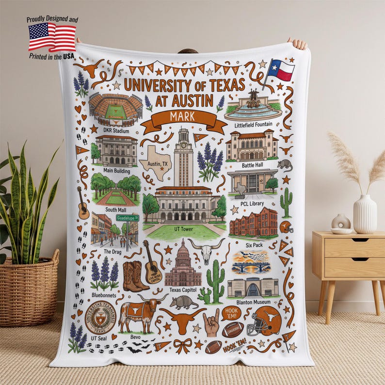 May include: White blanket featuring a detailed illustration of the University of Texas at Austin, including landmarks like the UT Tower and DKR Stadium. The design incorporates the university's colors and symbols, with the text "University of Texas at Austin".