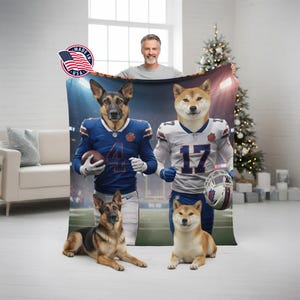 May include: A personalized blanket featuring two dogs in football uniforms, with a stadium backdrop. The blanket has a "Made in USA" emblem. Two dogs are also lying on the floor in front of the blanket.