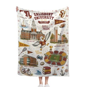 May include: White blanket featuring a map of Salisbury University with illustrations of campus buildings, a seagull mascot, and the text "Salisbury University" and "Go Gulls". The blanket includes a map of Salisbury, MD.