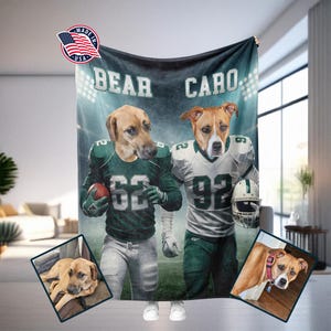 May include: A personalized blanket featuring two dogs digitally rendered as football players. One dog wears a green jersey with the number 62, holding a football. The other dog wears a white jersey with the number 92 and a helmet. The blanket has the text "BEAR CARO".
