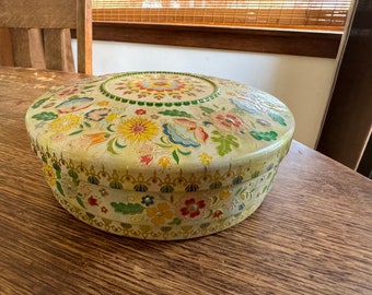 Colorful vintage floral cookie tin