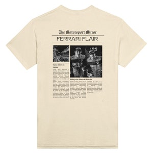 A Ferrari Newspaper-style graphic design at the back of the t-shirt, with the words Ferrari Flair at the back of the merchandise. Printed on a bright sand colored T-shirt.