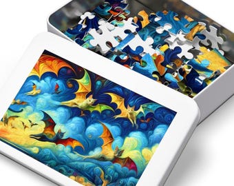 May include: A white puzzle box and a metal tin filled with puzzle pieces. The puzzle features a colorful illustration of bats flying in a cloudy sky with orange, yellow, and blue hues. The puzzle pieces are visible inside the tin.