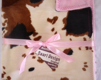 Cowgirl or Cowboy country western boutique baby blanket  cow spots