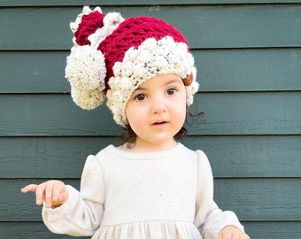Patrón de crochet para gorro de Papá Noel envuelto con pompones