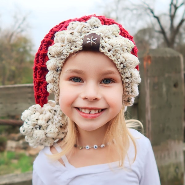 Il modello all'uncinetto per cappello da Babbo Natale con palle di neve include le taglie da bambino ad adulto