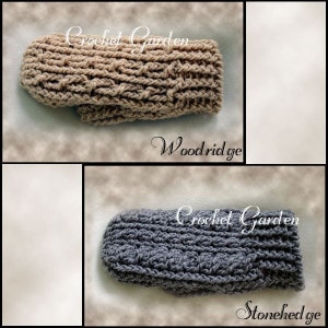 May include: Two crocheted fingerless gloves, one in a light brown color and the other in a dark gray color. The gloves are both made with a textured stitch pattern. The text "Crochet Garden" is written on both gloves. The brown glove is labeled "Woodridge" and the gray glove is labeled "Stonehedge".