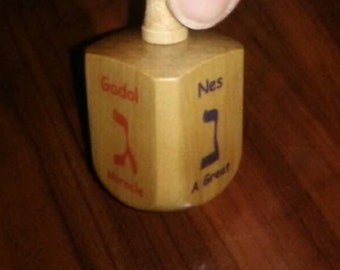 Hanukkah Dreidel with English & Hebrew - A Great Miracle Happened There