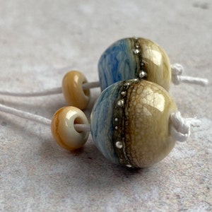 Marbled Blue and Ivory Glass Bead Pair