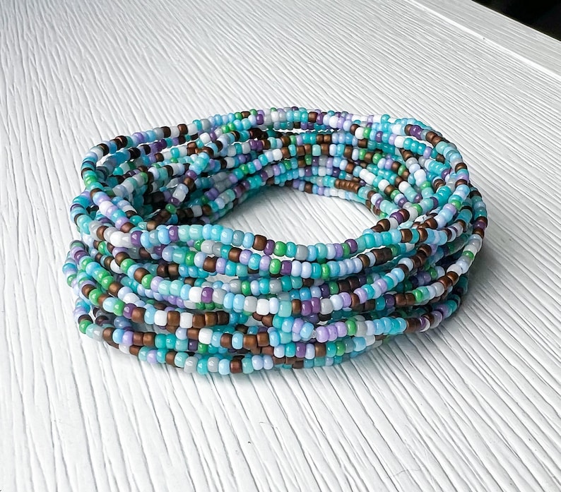 Seed Bead Bracelet Bohemian Style Glass Beads Stretch Elastic Band Colorful Design Santa Fe Inspired Jewelry Handmade Accessory Stackable Collection Boho Fashion Statement Southwestern Style Native American Influence Daily Wear Piece