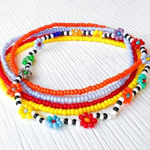 Summer Beach Bracelet Seed Bead Jewelry Colorful Daisy Pattern Stretch Elastic Band Beaded Wrist Accessory Stackable Design Multiple Colors Available Teen Fashion Trend Bohemian Style Collection Friendship Gift Idea Handmade Glass Beads